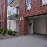 Red Wall Apartment In The Old Town